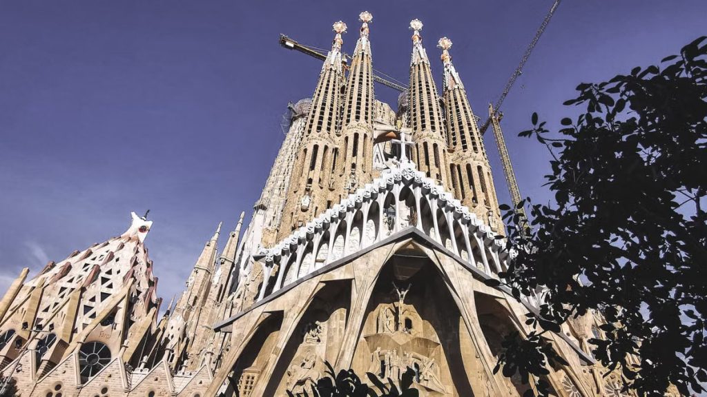 Stunning view of La Sagrada Familia's intricate facade and spires in Barcelona.